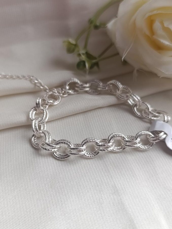 Pulseira prata elos entrelaçados